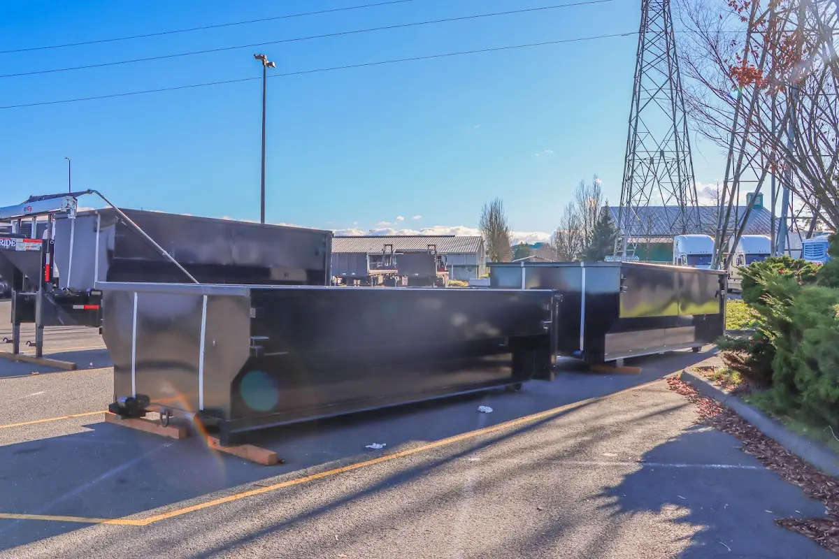 Roll-off dumpster ready for waste disposal at job site for 15 Yard Dumpster Rental in Ludington